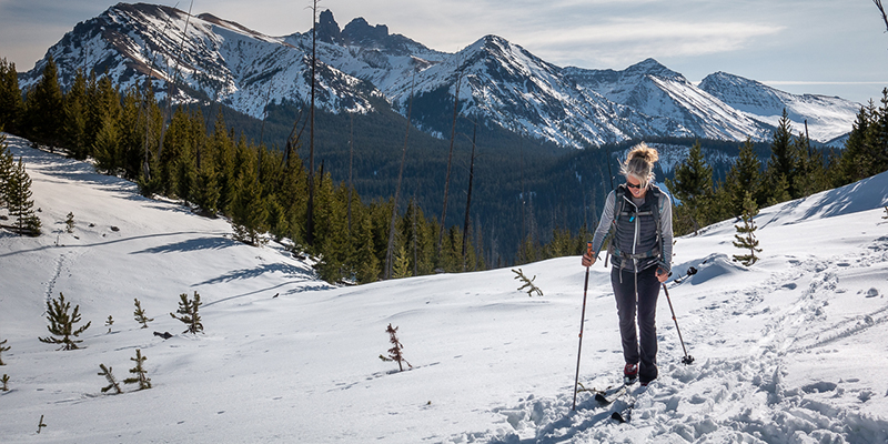 Woman nordic skiing near Cooke City, Montana.