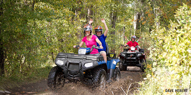 Family riding ATV's in Montana