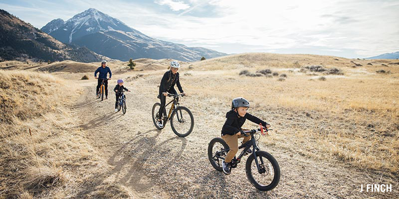 Family riding bikes in Montana.