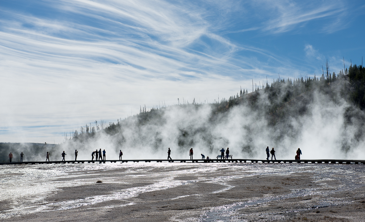 Visitors on a Summer day at Midway Geyser Basin in Yellowstone National Park near Yellowstone Country Montana
