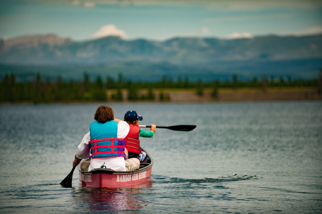 Canoeing on a mountain lake in Yellowstone Country Montana near Yellowstone National Park