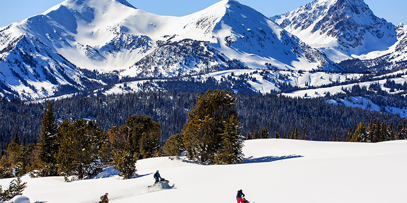 An Unforgettable Experience; Snowmobile Tours in Yellowstone Country