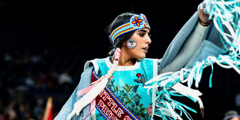 Native American dancer at AIC powwow, Montana State University 